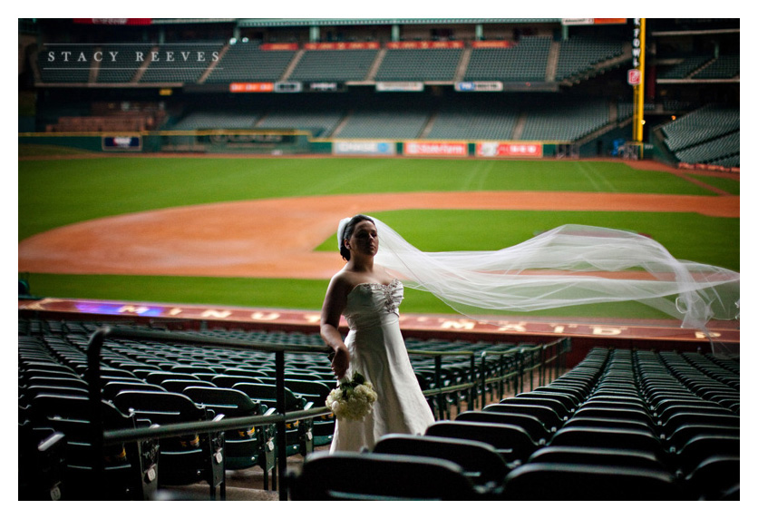 bridal bride portraits of Carrie Alexander Short at Union Station in Minute Maid Park in downtown Houston Texas, home of the Houston Astros baseball team, by Dallas wedding photographer Stacy Reeves