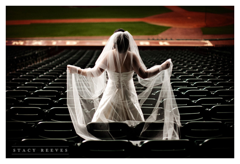 bridal bride portraits of Carrie Alexander Short at Union Station in Minute Maid Park in downtown Houston Texas, home of the Houston Astros baseball team, by Dallas wedding photographer Stacy Reeves