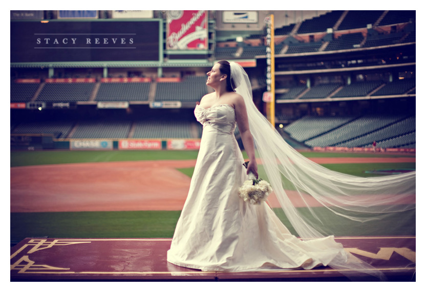 bridal bride portraits of Carrie Alexander Short at Union Station in Minute Maid Park in downtown Houston Texas, home of the Houston Astros baseball team, by Dallas wedding photographer Stacy Reeves