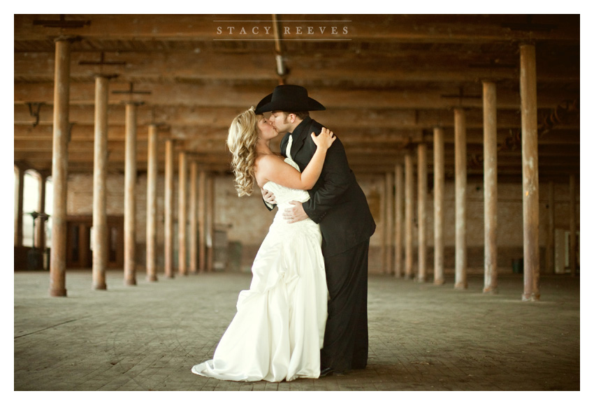 rustic country Day After bride and groom portrait session of Jenny Burdett Fain and Casey Fain at the Old McKinney Cotton Mill abandoned warehouse by Dallas wedding photographer Stacy Reeves