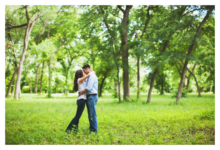 woodsy forest engagement photo session of Erin Mazur and Tyler Hufstettler by Dallas wedding photography Stacy Reeves