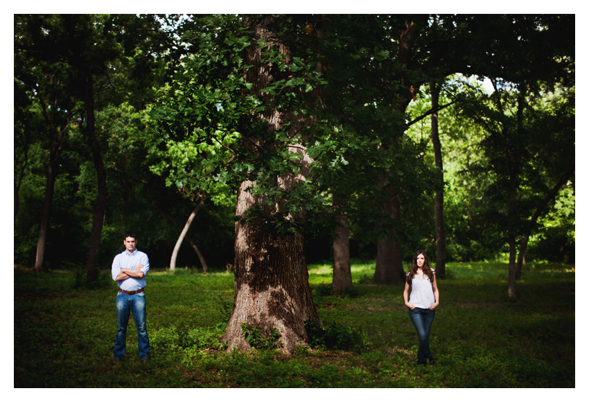 woodsy forest engagement photo session of Erin Mazur and Tyler Hufstettler by Dallas wedding photography Stacy Reeves