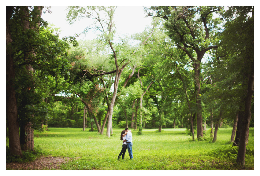 woodsy forest engagement photo session of Erin Mazur and Tyler Hufstettler by Dallas wedding photography Stacy Reeves