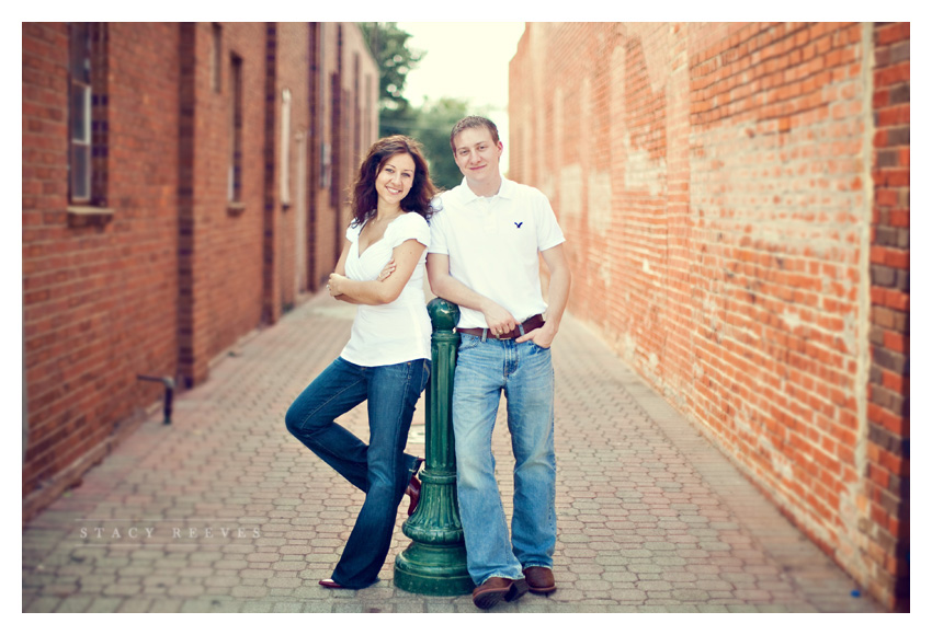 engagement session photos of Julie Lasater and Colin Beal in historic downtown Grapevine near Main Street by Dallas wedding photographer Stacy Reeves