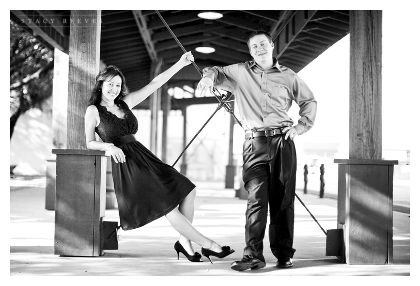 engagement session photos of Julie Lasater and Colin Beal in historic downtown Grapevine near Main Street by Dallas wedding photographer Stacy Reeves