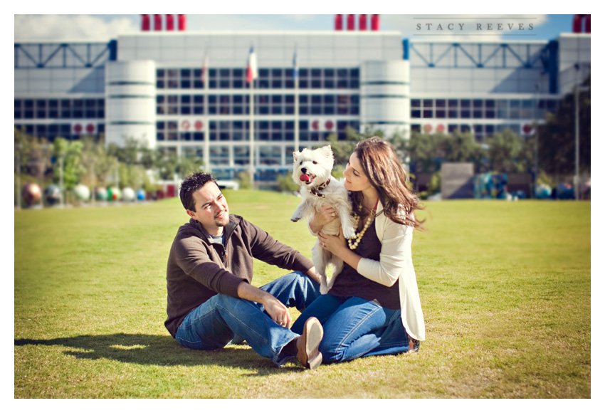 Engagement photos of Jamie Riley and Garrett Roy at Discovery Green Park in downtown Houston by Dallas wedding photographer Stacy Reeves