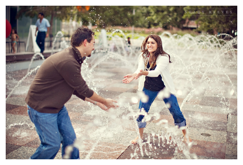 Engagement photos of Jamie Riley and Garrett Roy at Discovery Green Park in downtown Houston by Dallas wedding photographer Stacy Reeves