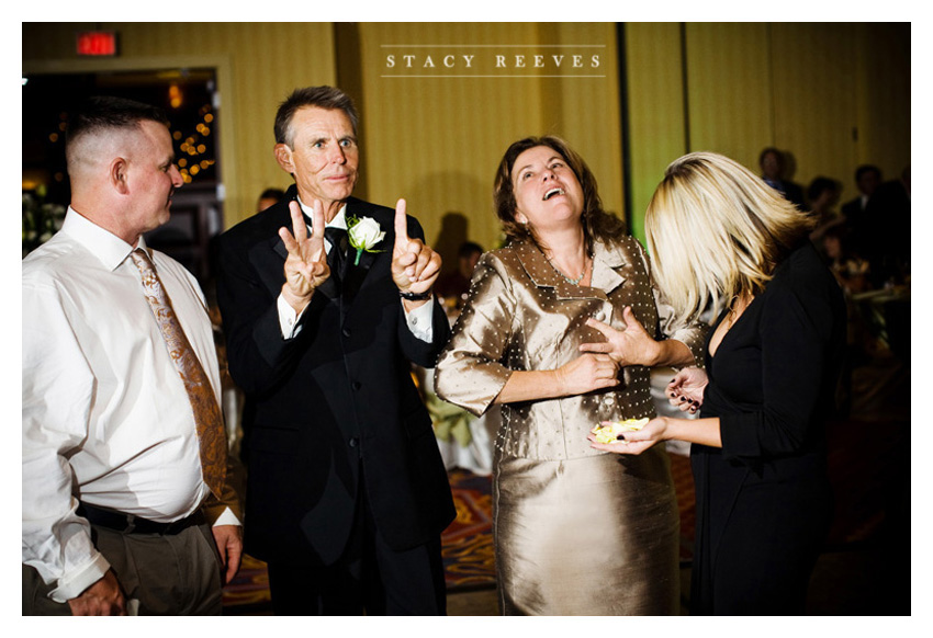 wedding of erin hartnett and adrian lewis in downtown fort ft. worth at the TCU Robert Carr chapel and Renaissance Worthington hotel by Dallas wedding photographer Stacy Reeves