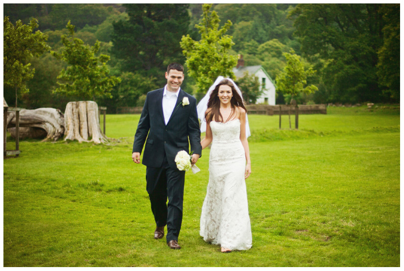 portraits of bride and groom in the wind and rain after wedding day ceremony in the Irish mountains by Stacy Reeves