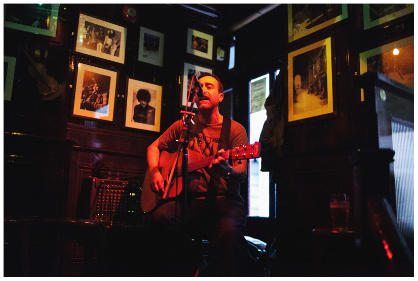 guitar singer performing traditional Irish music at wedding reception at Temple Bar in downtown Dublin Ireland by Stacy Reeves