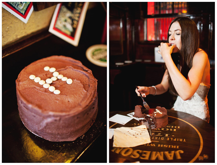 bride eats small wedding cake top tier at Temple Bar in Dublin Ireland during a wedding reception