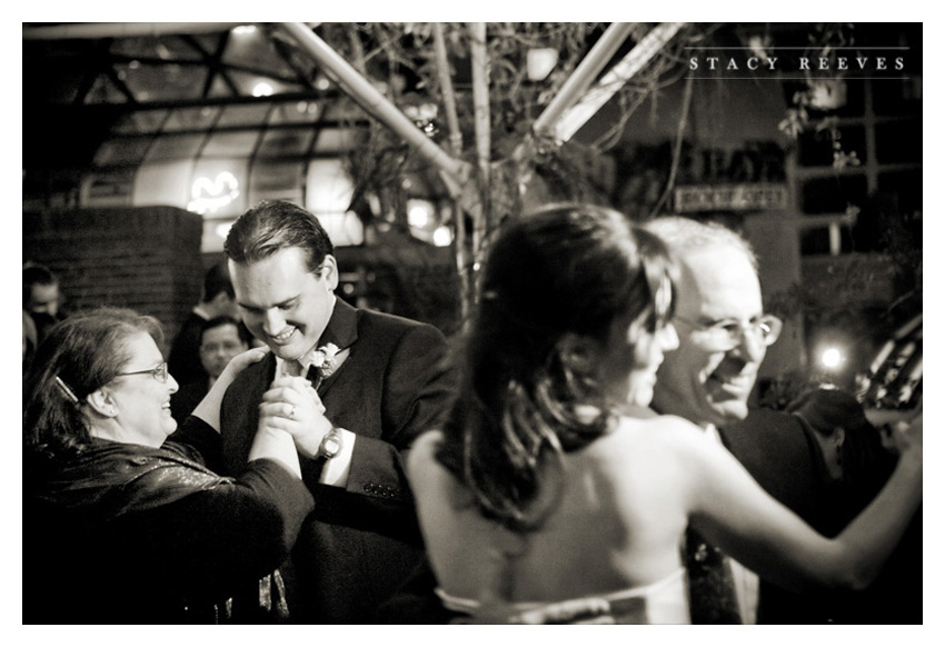 wedding ceremony and reception photos of Jennifer Jenni Neubauer and Cade Lovelace at the Fort Worth Botanical Garden Lower Rose Gardenand the Reata rooftop downtown by Dallas wedding photographer Stacy Reeves